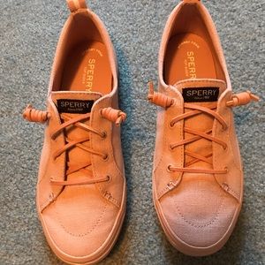 Woman’s rose gold sperry